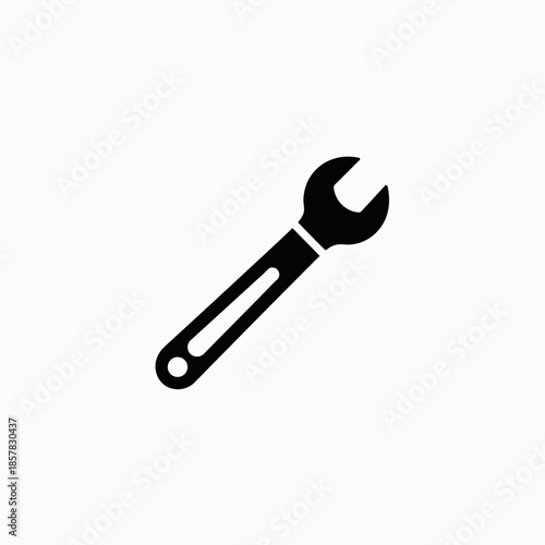 Black adjustable wrench in simple flat design on white background  