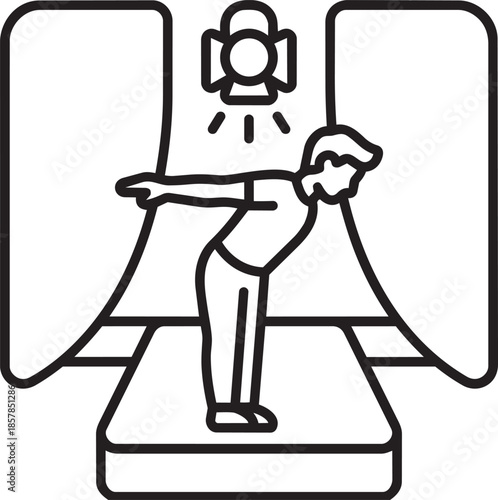 Male model bowing on catwalk under spotlight during theater performance or high fashion show