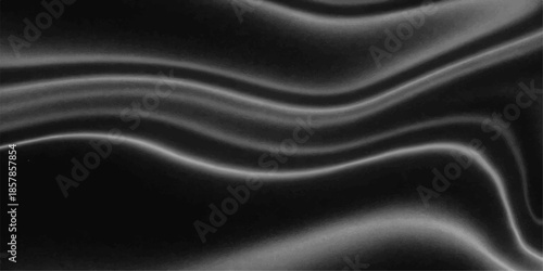 Smooth black satin fabric with flowing waves and a shiny silk texture creates a luxury dark material backdrop for elegant fashion designs