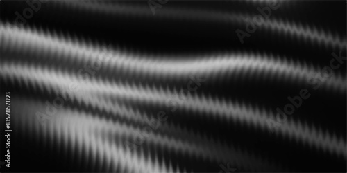 Abstract black satin background with smooth flowing silk waves and soft light curves creating a textured fabric pattern for an elegant textile backdrop design
