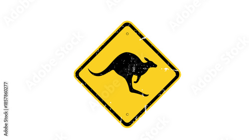 A yellow road sign featuring a dog silhouette acts as a caution symbol for a wet floor and potential animal crossing hazard on an Australian street