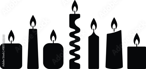 Collection of black candle silhouettes in various shapes and sizes with burning flames for home decor, relaxation, aromatherapy, and celebration