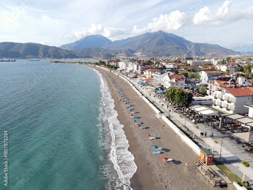 Aerial view of Çalış Beach, a long pebble beach located along the Mediterranean coast of Fethiye in Turkey.