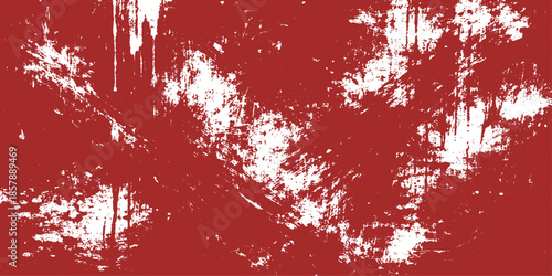 A vibrant red grunge texture background featuring artistic blood splatters and ink splashes mixed with winter snowflake patterns for a festive Christmas holiday card design illustration