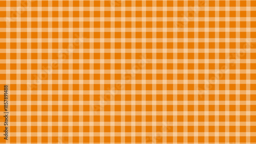 Orange and white plaid fabric texture background. Seamless pattern checkered wallpaper.
