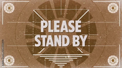 Vintage “Please Stand By” test card with radial calibration pattern, sepia tone, and film dust texture