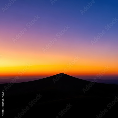 Stunning tranquil sunset at the golden hour of dusk, featuring a serene landscape silhouette against the vibrant twilight sky, peaceful, background, natural