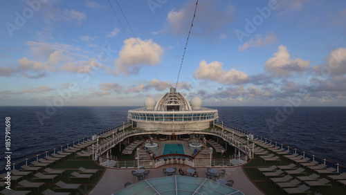 Panorama of cruise ship deck and morning clouds