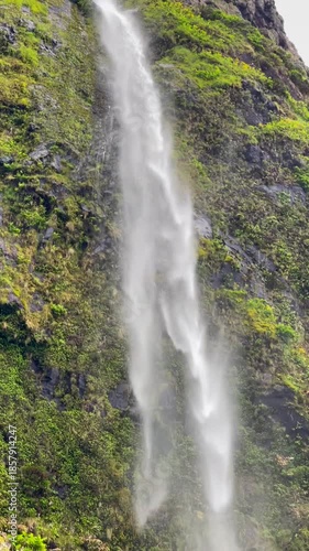 Poco do Bacalhau waterfall cascading over rocks