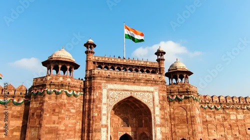 Historical structure with a flag waving on a sunny day