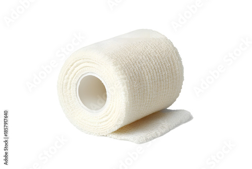 Roll of white bandage placed on a flat surface in a well-lit room during the day