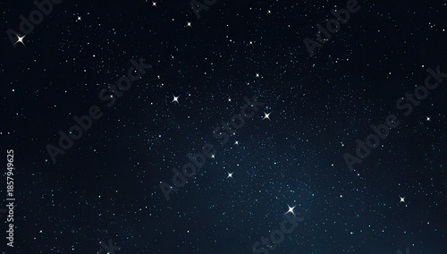 Dazzling stars glitter against a deep blue, textured, starry sky backdrop