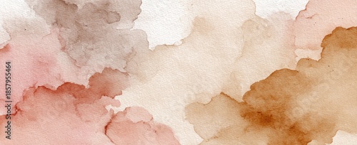 Washes of earth tone watercolors blend on textured paper