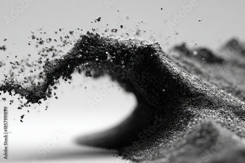Abstract Wave: Witness the mesmerizing artistry of fine particles converging to form a dynamic wave, capturing an element of natural power. 
