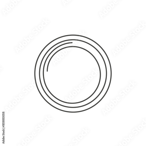 Close-up of Circular Metallic Object with Intricate Grooves and Reflective Surface