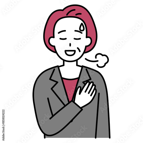 胸に手を当ててホッとする中年のスーツの女性