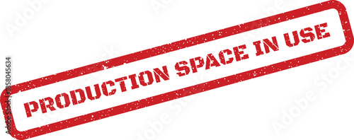 Red textured rubber stamp graphic clearly stating that production facility space is currently in use