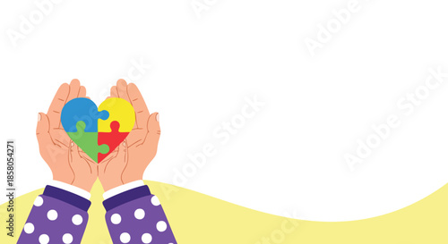 Hands holding a colorful puzzle heart symbol against a simple background conveying care and unity for diverse causes