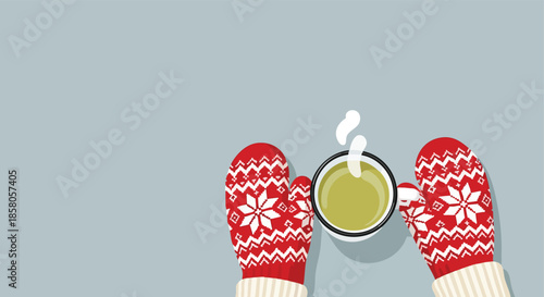 Cozy winter scene featuring hands in festive mittens holding a steaming mug of green tea against a serene grey background, perfect for seasonal