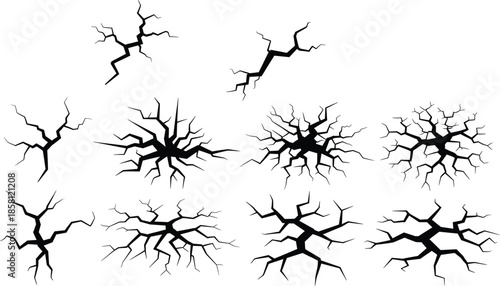 Set of black crack silhouettes and branching fissure patterns on a white background