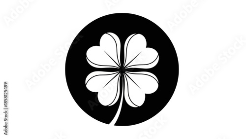 Four-leaf clover in a black circle, symbol of luck and St. Patrick's Day.