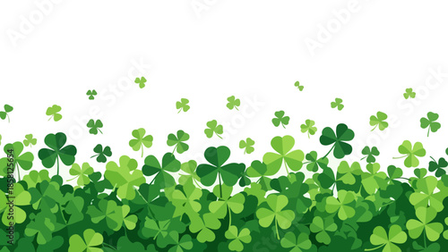 St. Patrick's Day background with shamrocks and clovers on a white background.