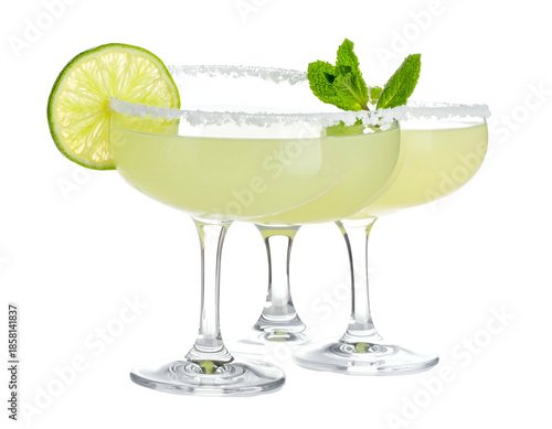 Two refreshing, pale green cocktails with salt rims and garnish