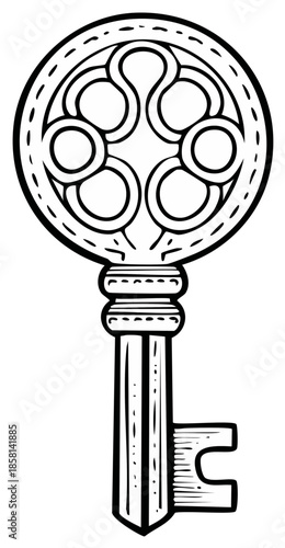 Ornate antique key with intricate scrollwork in a decorative vintage design