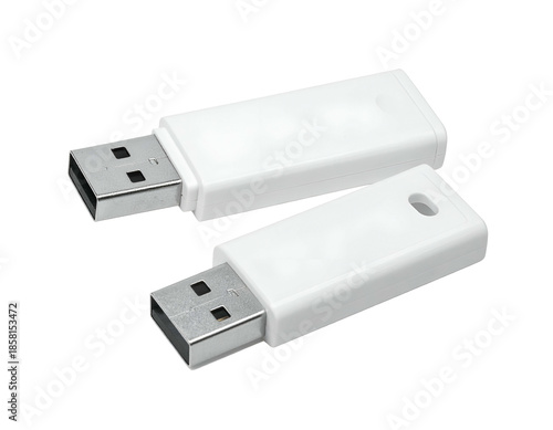 Two white, blank USB flash drives on a black background