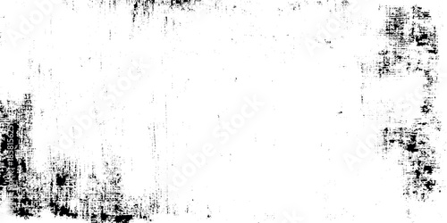 A distressed rectangular frame effect with a rough textured black and white appearance suggesting aging or damage