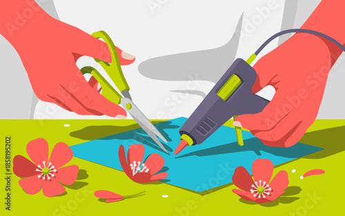 A pair of hands skillfully crafts beautiful paper flowers using scissors and a glue gun, showcasing creativity and the joy of hands-on artistic expression in crafting projects.