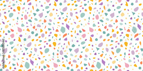 Colorful abstract pattern of scattered organic shapes on a white background