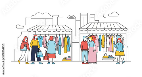 People shopping at outdoor clothing market stalls