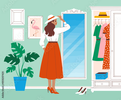 A stylish woman is assessing her outfit in front of a chic wardrobe with colorful dresses and accessories, embodying modern fashion and personal style exploration.
