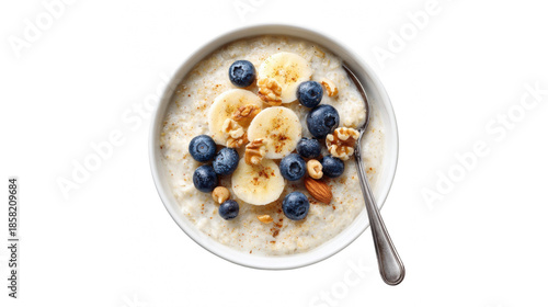 Creamy oatmeal topped with vibrant blueberries, sliced bananas, and a mix of healthy nuts.