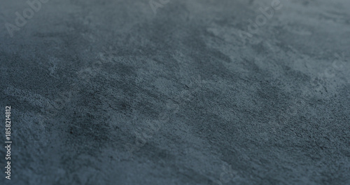 decorative dark concrete background with shallow focus