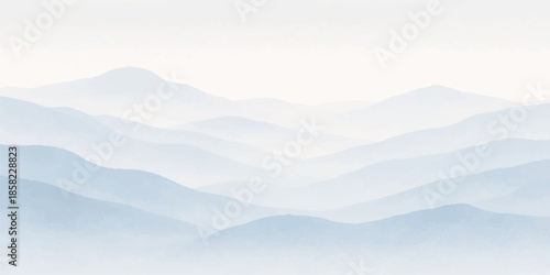 A misty mountain landscape with snow peaks and a forest valley glows under a blue sunset sky where clouds meet the morning horizon
