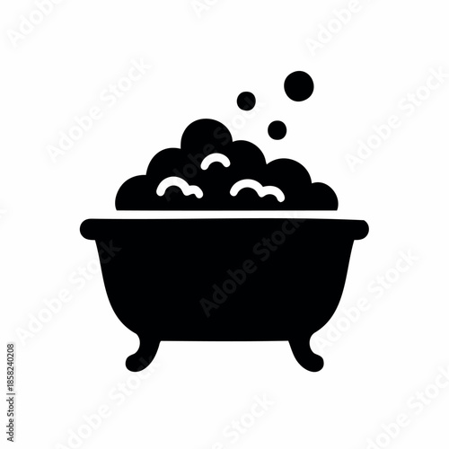 Bathtub filled with soap bubbles and foam icon, simple black silhouette representing bath time, hygiene, and relaxation