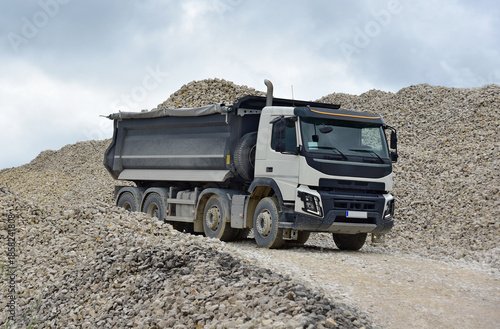 A large dump truck in operation at a quarry