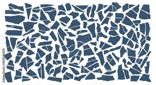 An abstract background or texture featuring a pattern of dark blue shattered pieces resembling broken glass or mosaic tiles.