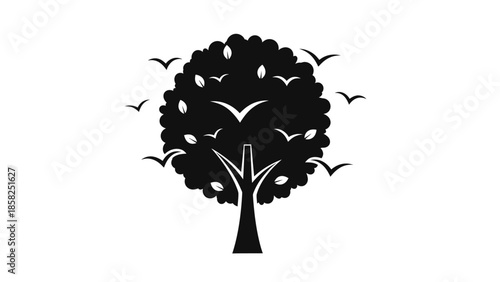 Silhouette of a Tree with Birds Flying Around.