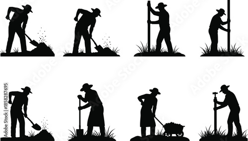 Silhouette of a man working outdoors digging and building