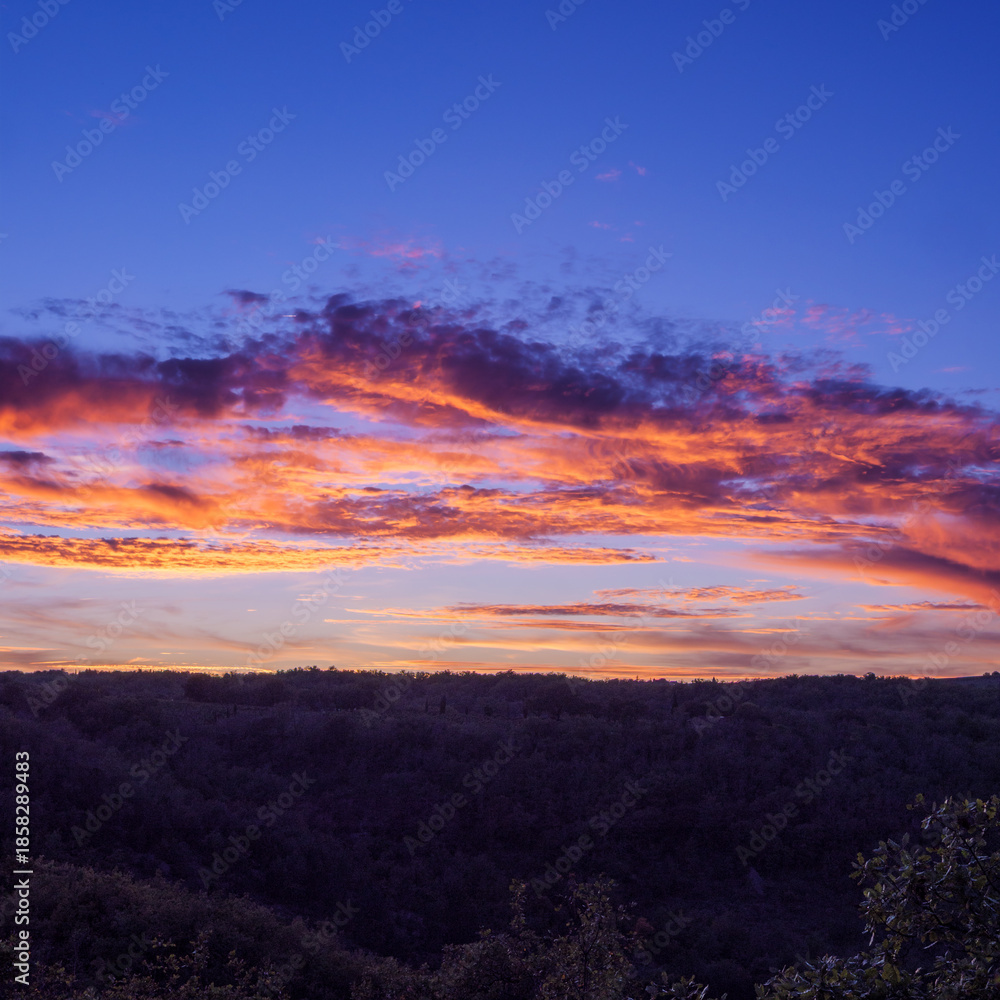 Fototapeta premium Dramatic Fiery Orange And Purple Sunset Sky Background