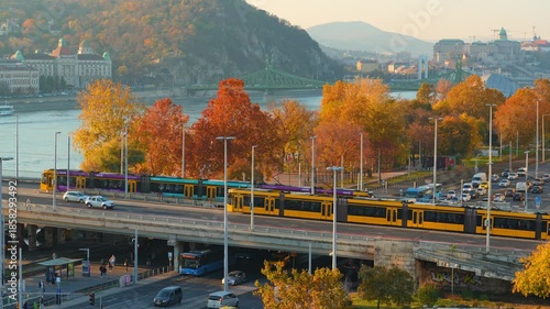 Panoramic view of Budapest and Danube River, city architecture, Petofi bridge and road traffic
