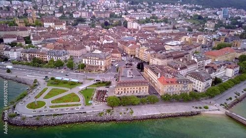 Aerial summer view of Neuchâtel with the city and Lake Neuchâtel under clear blue sky