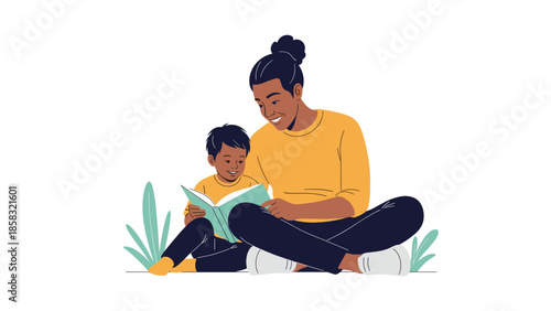 Loving father sitting on the grass and reading a storybook to his young son in a heartwarming family moment outdoors.