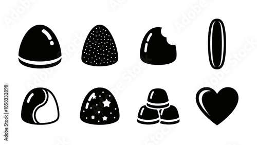 Collection of various black and white candy and chocolate silhouettes, including bonbons, truffles, and heart shapes, depicting sweet treats.