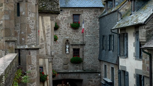 Mont-Saint-Michel, Normandy, 08-24-2024. Hstoric Medieval house inside the walls of Mont Saint-Michel. Video 4K