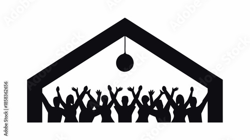 People celebrating under a roof with a hanging object