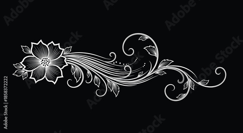 Decorative white floral flourish with swirls and delicate leaves set against a solid black background for elegant graphic accents.